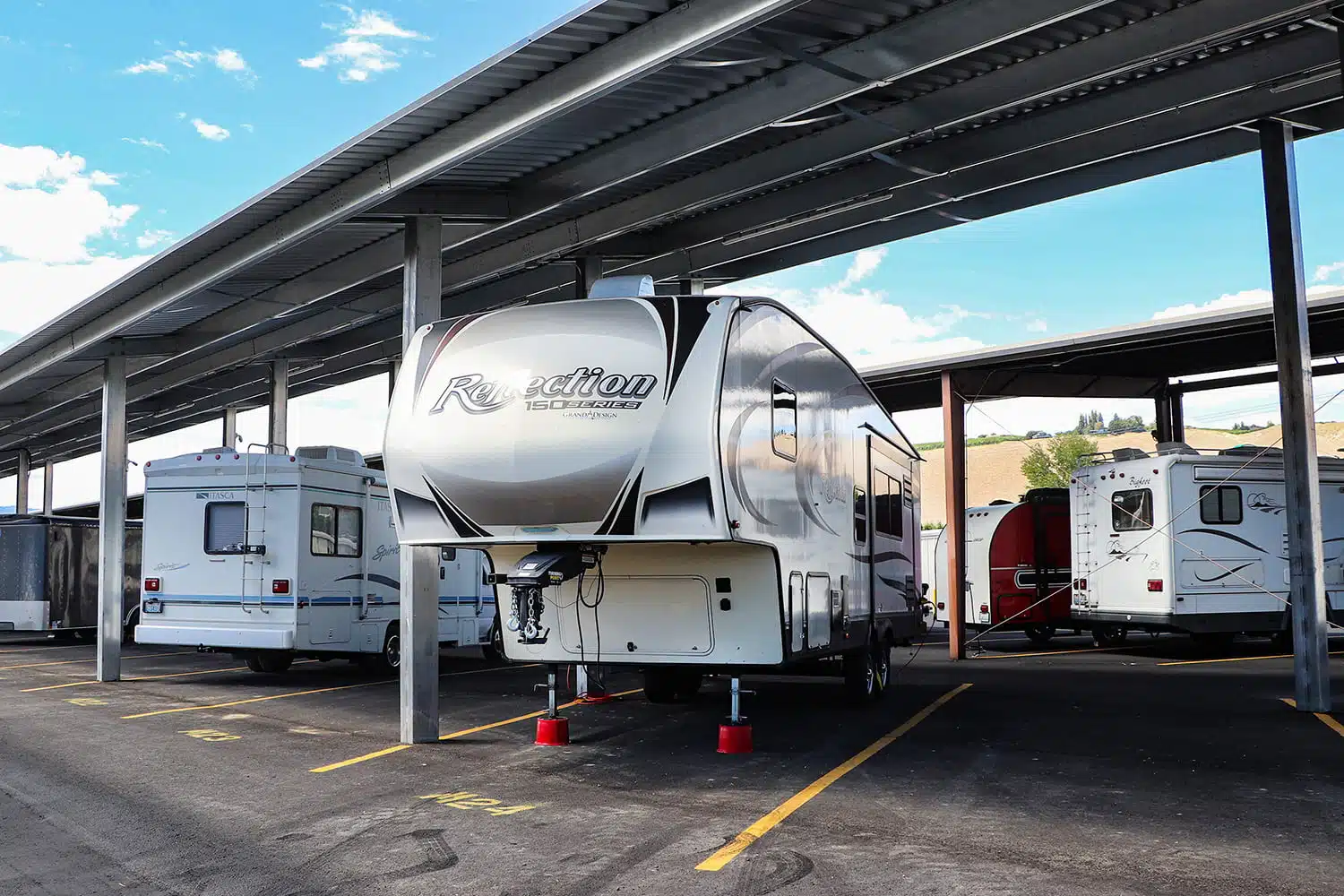 Campers shown in covered parking area