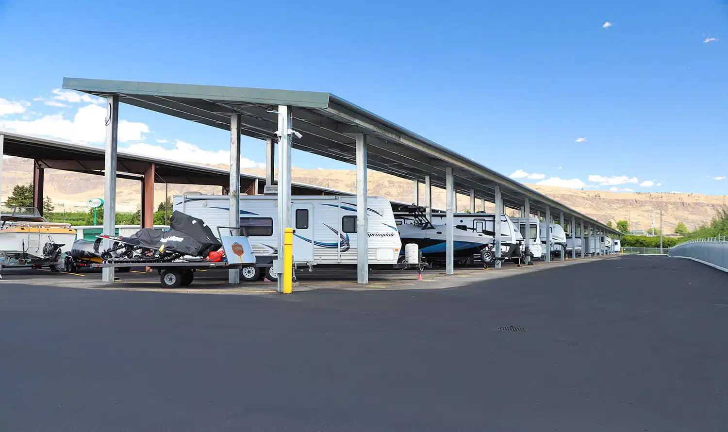 RV's and vehicles in covered parking space